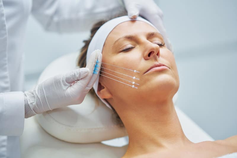 Dermatologist performing chemical peel at Pasadena chemical peel clinic Dynasty Dermatology Pasadena, CA