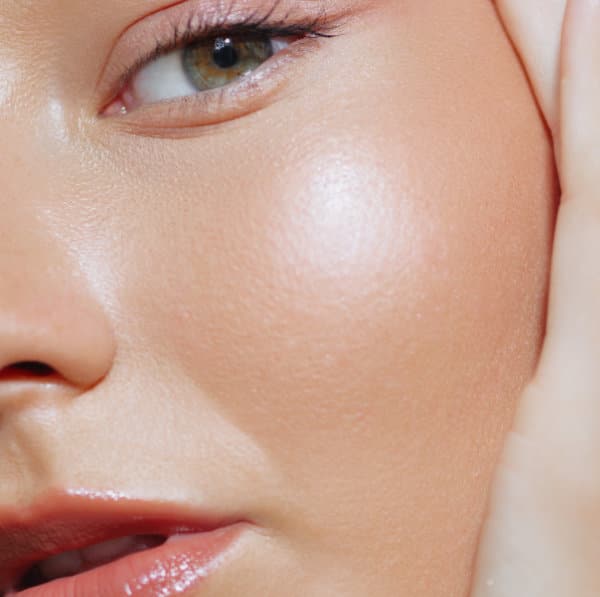 Close up of a woman's face showing flawless skin